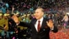 Kazakhstan - FILE PHOTO: Kazakh President Nursultan Nazarbayev waves to supporters after his victory in the presidential election was officially announced in Astana, Kazakhstan December 5, 2005. REUTERS/Stringer/File Photo